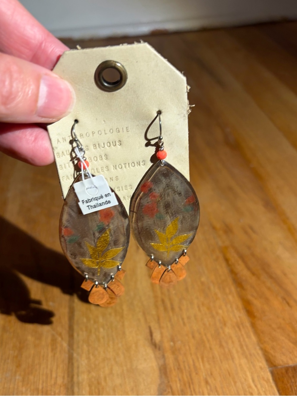 Anthropologie Leaf Motif Dangle Earrings in Orange and Gold